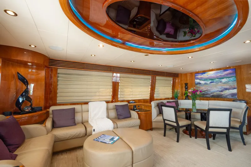 Kismet Yacht Photos Pics Luxurious interior of 2003 Hargrave Skylounge yacht with elegant seating and modern decor.