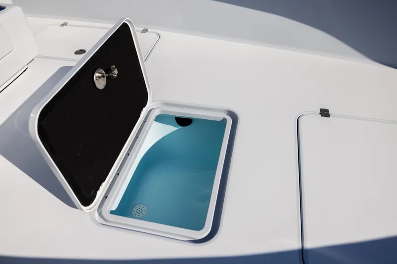  Yacht Photos Pics Open storage compartment on 2025 Conch 33 boat deck.