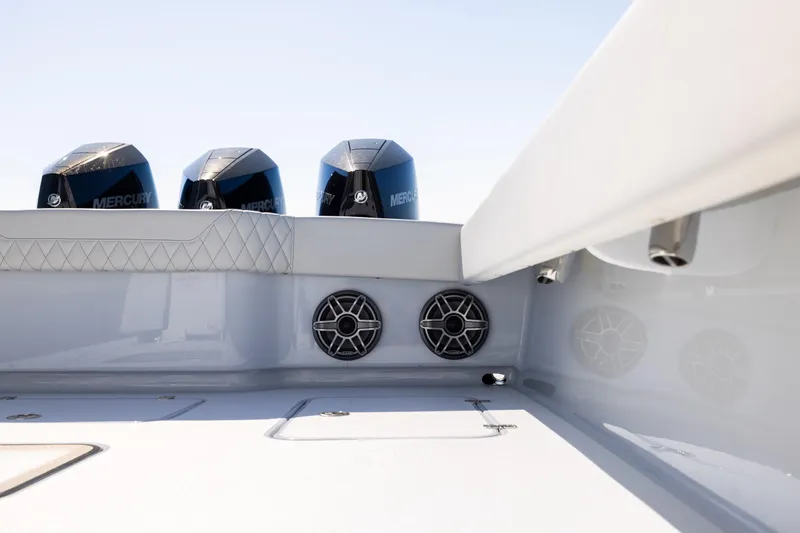  Yacht Photos Pics 2025 Conch 33 boat with Mercury engines and sleek interior design.