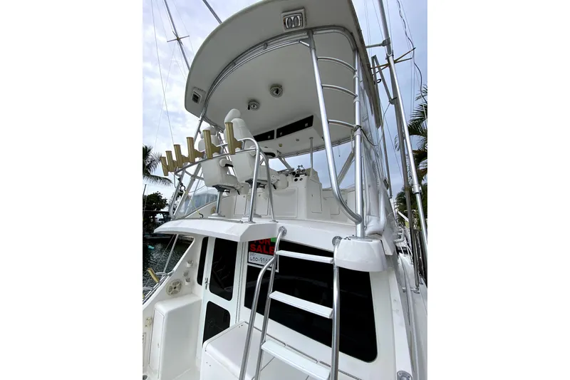 Belle La Vie Sur La Mer Yacht Photos Pics 2001 Egg Harbor 37 Convertible yacht with flybridge and ladder, for sale.