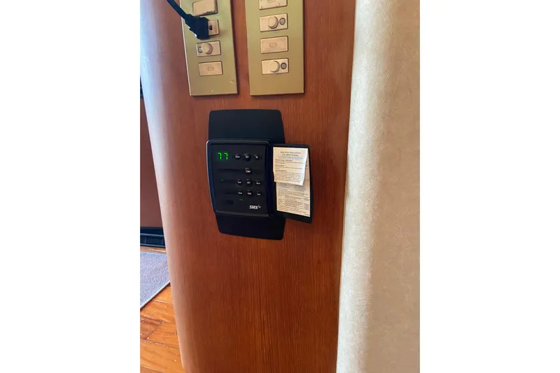 Belle La Vie Sur La Mer Yacht Photos Pics Control panel on 2001 Egg Harbor 37 Convertible yacht interior.