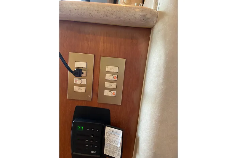 Belle La Vie Sur La Mer Yacht Photos Pics Control panel on 2001 Egg Harbor 37 Convertible yacht interior.