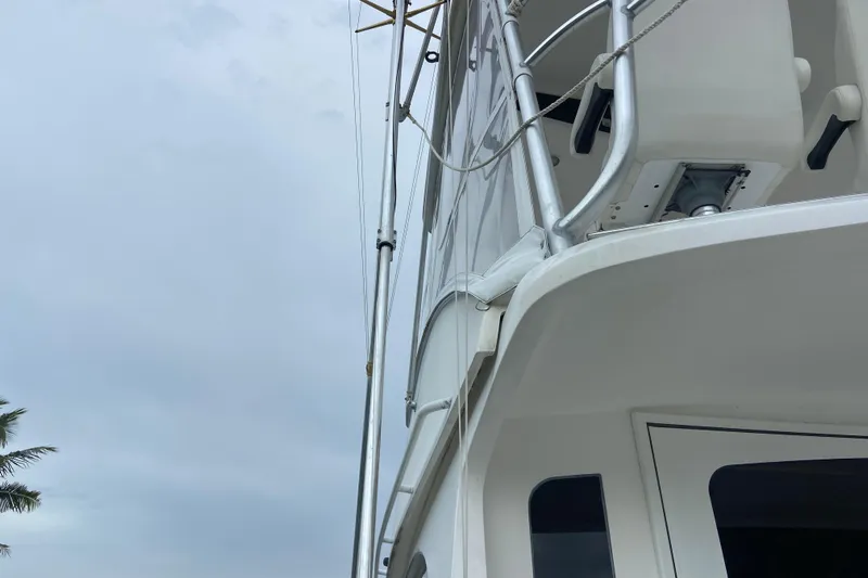 Belle La Vie Sur La Mer Yacht Photos Pics Egg Harbor 37 Convertible yacht, 2001 model, partial view with overcast sky.