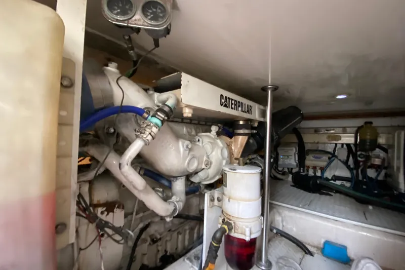 Belle La Vie Sur La Mer Yacht Photos Pics Engine room of 2001 Egg Harbor 37 Convertible with Caterpillar engine components.