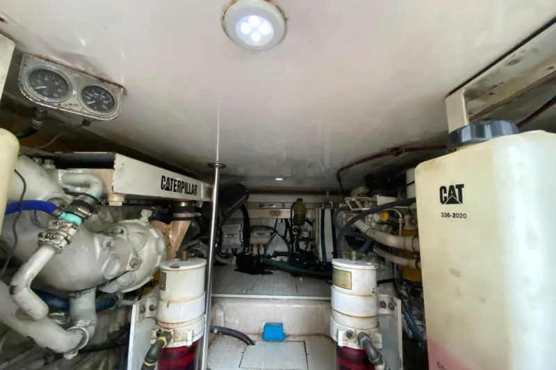 Belle La Vie Sur La Mer Yacht Photos Pics Engine room of 2001 Egg Harbor 37 Convertible with Caterpillar components.