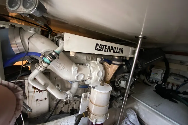 Belle La Vie Sur La Mer Yacht Photos Pics Engine room of 2001 Egg Harbor 37 Convertible with Caterpillar engine components.
