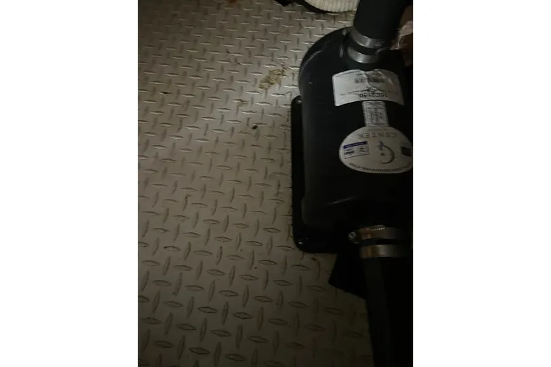 Belle La Vie Sur La Mer Yacht Photos Pics Engine room detail of 2001 Egg Harbor 37 Convertible with diamond plate flooring.