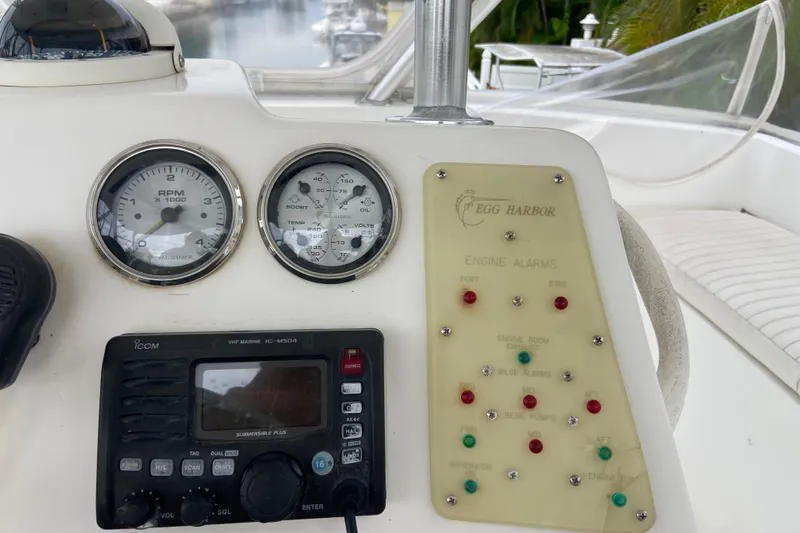 Belle La Vie Sur La Mer Yacht Photos Pics Control panel of a 2001 Egg Harbor 37 Convertible boat with gauges and alarms.