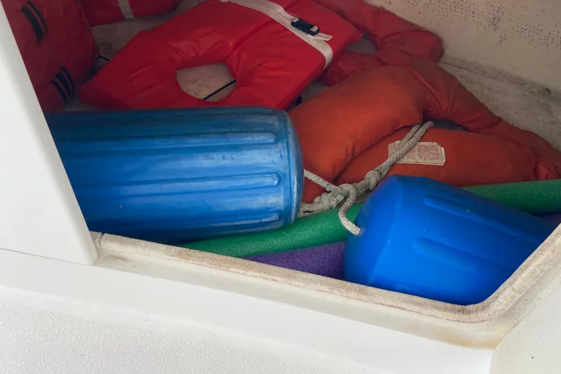 Belle La Vie Sur La Mer Yacht Photos Pics Life jackets and fenders in Egg Harbor 37 Convertible boat storage, 2001 model.