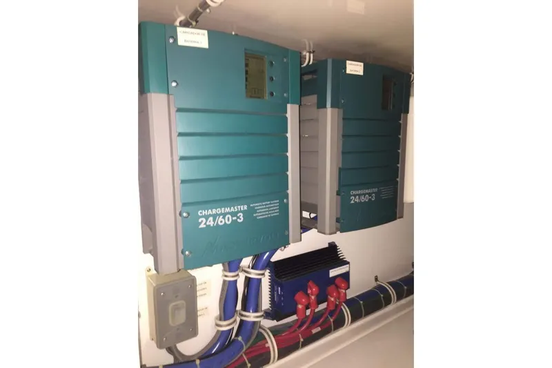 Caraibi Yacht Photos Pics Electrical system of a 2013 Hatteras GT63 yacht featuring ChargeMaster 24/60-3 units.