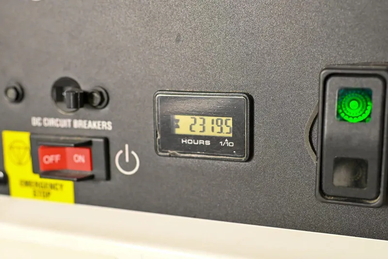 Caraibi Yacht Photos Pics Control panel of a 2013 Hatteras GT63 yacht showing 2319.5 hours.