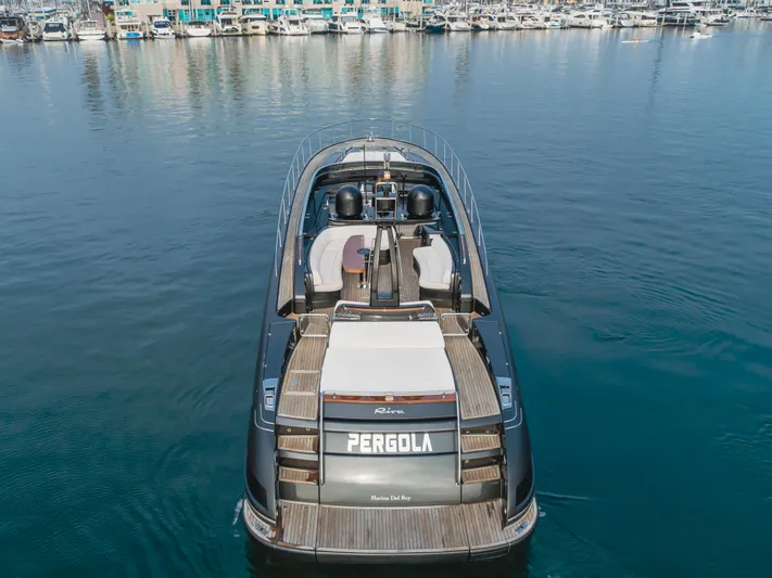 Pergola Yacht Photos Pics Luxury 2016 Riva 63 Virtus yacht docked in marina, rear view.