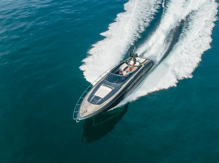 Pergola Yacht Photos Pics Aerial view of 2016 Riva 63 Virtus luxury yacht cruising on open water.