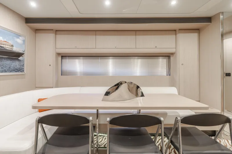 Pergola Yacht Photos Pics Luxurious interior of 2016 Riva 63 Virtus yacht with modern dining area.