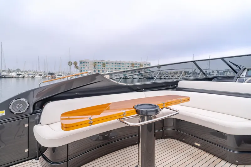 Pergola Yacht Photos Pics Luxurious 2016 Riva 63 Virtus yacht with elegant seating and sleek design in marina setting.