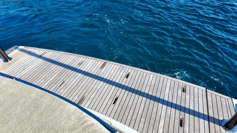  Yacht Photos Pics Invictus TT460 yacht deck overlooking blue ocean water, 2020 model.