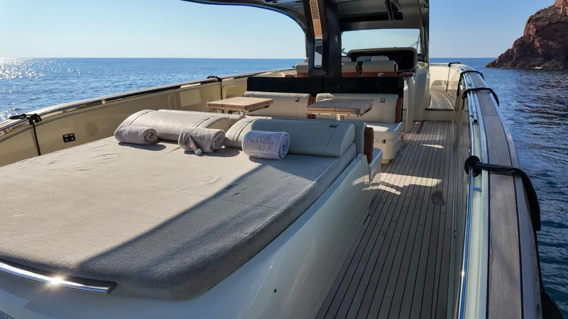  Yacht Photos Pics Luxurious 2020 Invictus TT460 yacht with sunbathing area and ocean view.