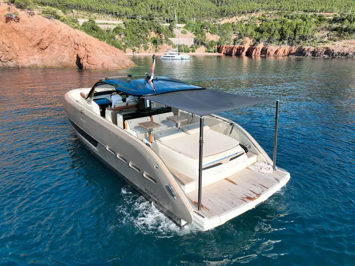  Yacht Photos Pics Invictus TT460 yacht cruising in scenic coastal waters, 2020 model.