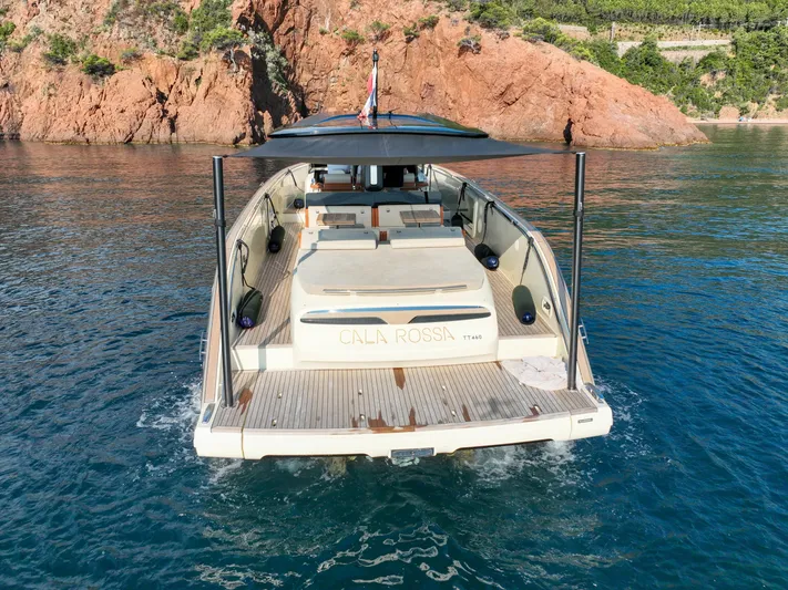  Yacht Photos Pics Luxury Invictus TT460 yacht cruising near rocky coastline, 2020 model.