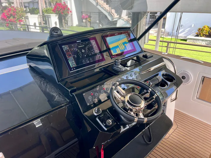  Yacht Photos Pics Helm of 2024 Pardo Yachts P38, featuring modern navigation displays and controls.