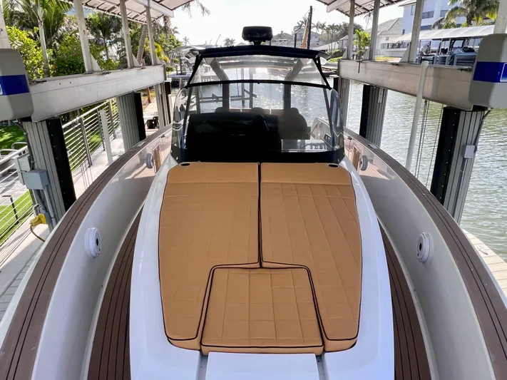  Yacht Photos Pics 2024 Pardo Yachts P38 on a lift, featuring sleek design and spacious deck.