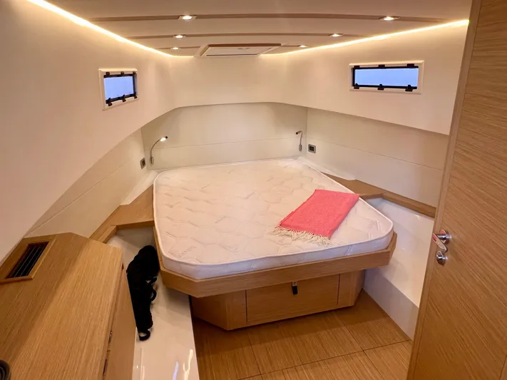  Yacht Photos Pics Luxurious cabin interior of 2024 Pardo Yachts P38 with cozy bed and modern design.