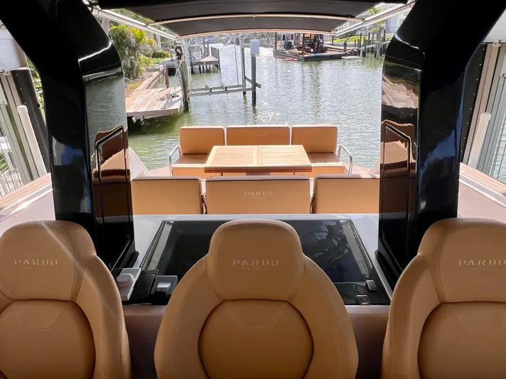  Yacht Photos Pics 2024 Pardo Yachts P38 interior with leather seats and waterfront view.