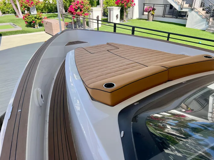  Yacht Photos Pics 2024 Pardo Yachts P38 deck with cushioned seating and sleek design.