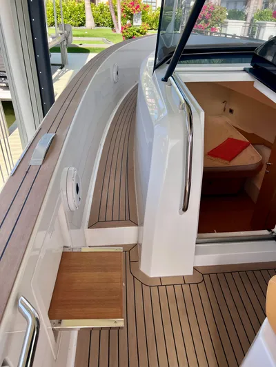  Yacht Photos Pics 2024 Pardo Yachts P38 interior with teak flooring and cabin entrance.