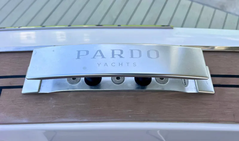  Yacht Photos Pics Pardo Yachts P38 2024 model, featuring sleek metallic branding on wooden deck.