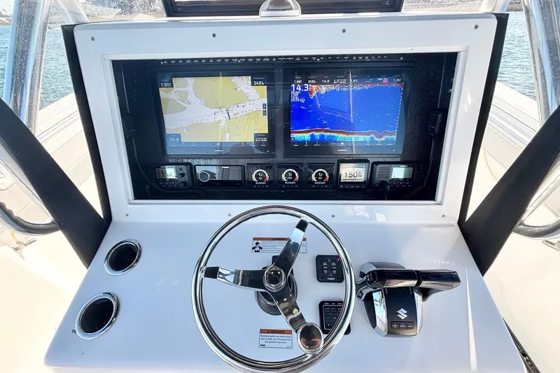  Yacht Photos Pics 2024 SeaHunter 39 Tournament helm with advanced navigation and control systems.
