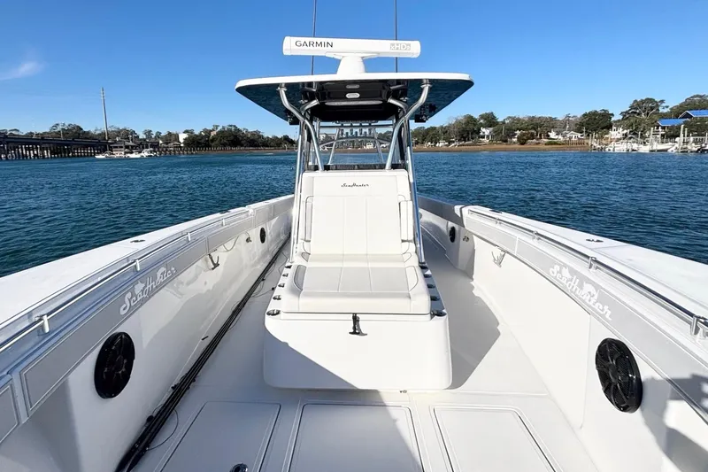  Yacht Photos Pics 2024 SeaHunter 39 Tournament boat on water, featuring spacious deck and Garmin equipment.