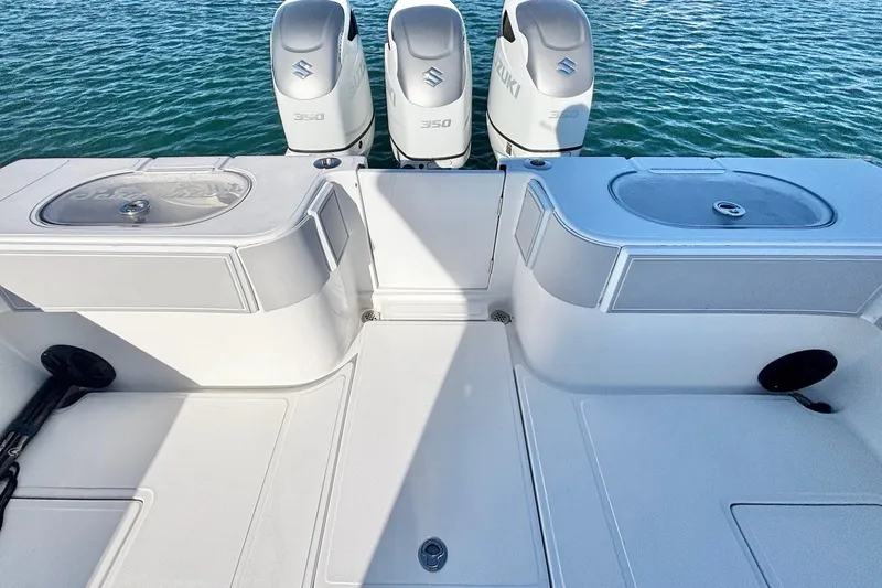  Yacht Photos Pics 2024 SeaHunter 39 Tournament boat with triple Suzuki 350 engines on water.