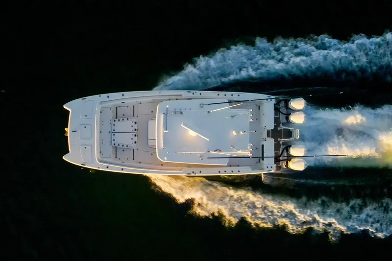  Yacht Photos Pics Aerial view of 2022 World Cat 400 CC-X boat cruising on water.
