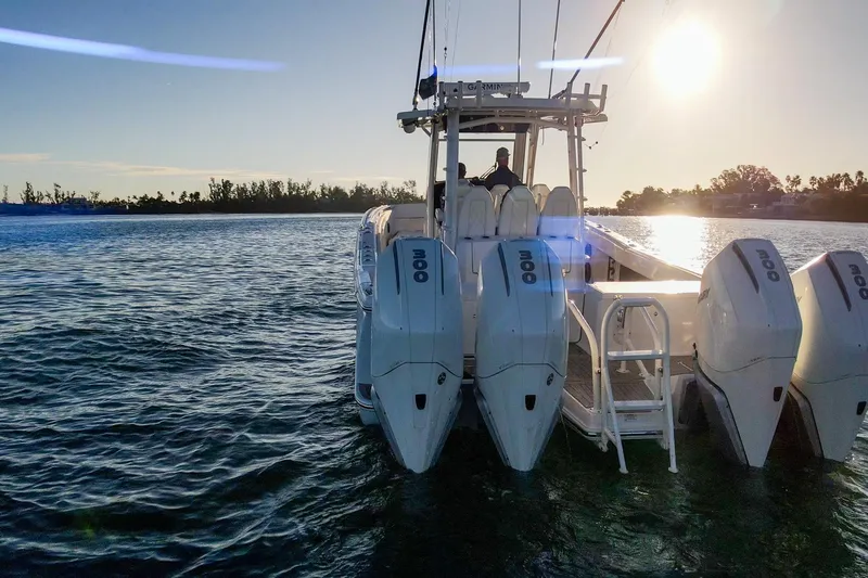  Yacht Photos Pics 2022 World Cat 400 CC-X boat with four engines on a sunny day.
