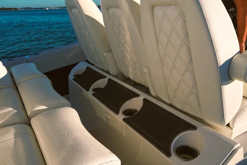  Yacht Photos Pics Luxurious seating on 2022 World Cat 400 CC-X boat with ocean backdrop.