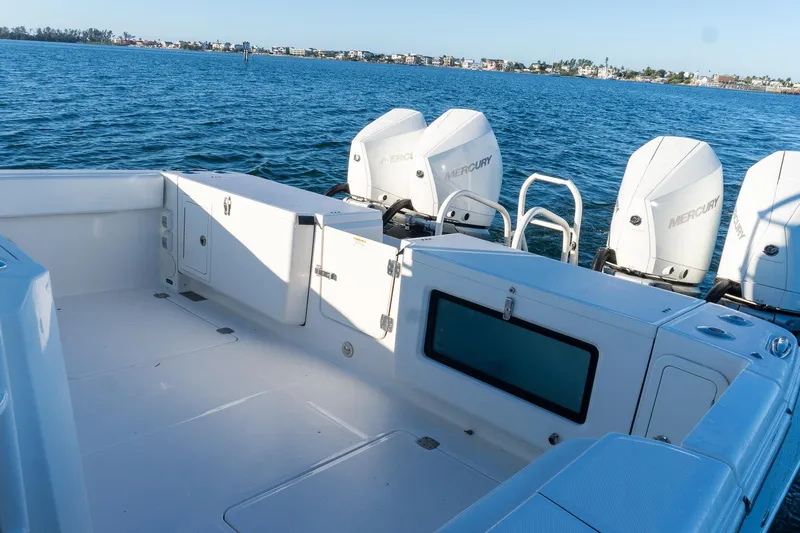  Yacht Photos Pics 2022 World Cat 400 CC-X boat with Mercury engines on open water.