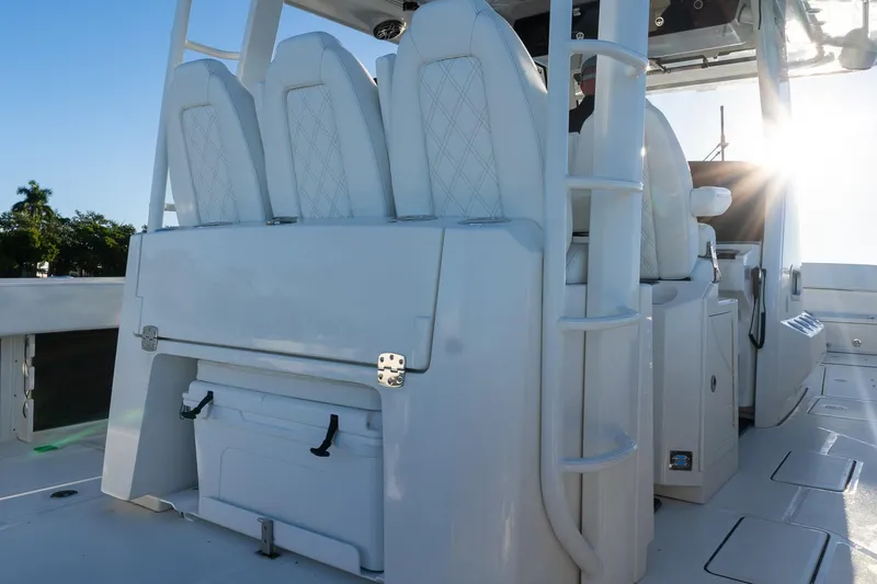  Yacht Photos Pics 2022 World Cat 400 CC-X boat interior with seating and storage compartments.