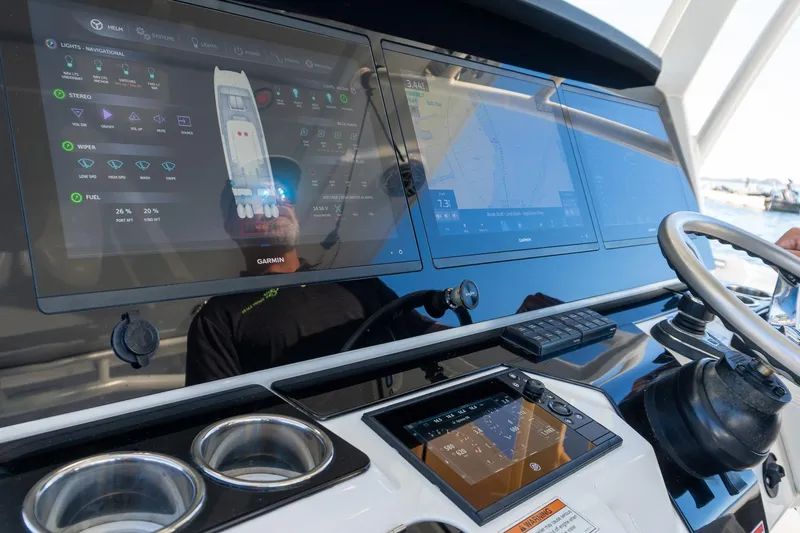  Yacht Photos Pics Control panel of 2022 World Cat 400 CC-X boat with advanced navigation displays.