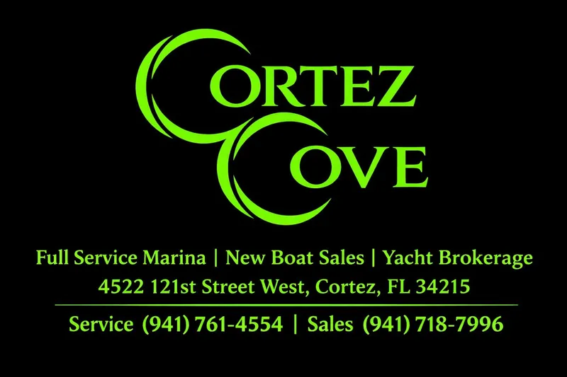  Yacht Photos Pics Cortez Cove Marina advertisement with contact details and services in bright green text.