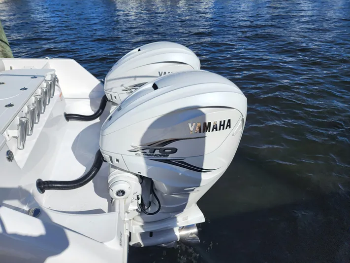  Yacht Photos Pics 2019 Everglades 365 boat with twin Yamaha outboard engines on water.