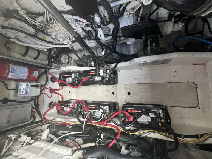  Yacht Photos Pics Engine compartment of a 2000 Formula 41 PC boat with visible wiring and batteries.