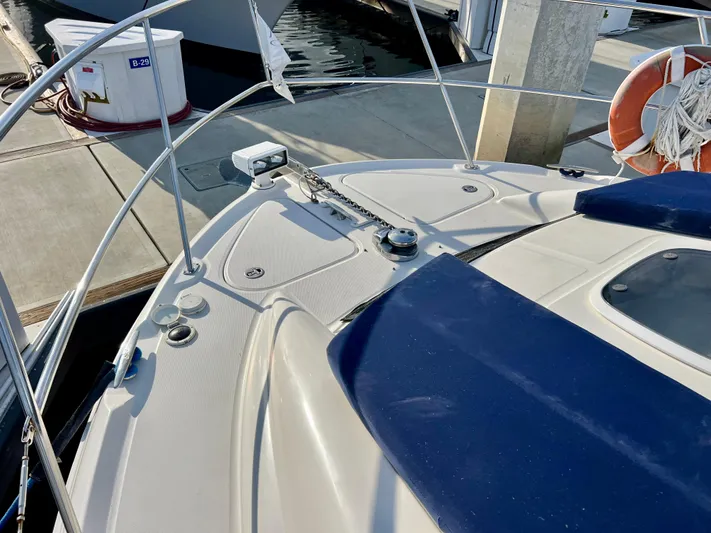 Reflections Yacht Photos Pics 2005 Sea Ray 390 Motor Yacht bow at marina dock.