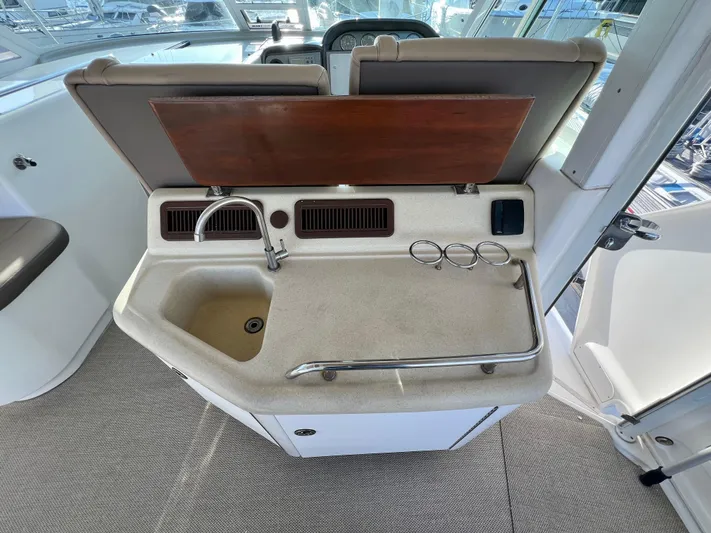 Reflections Yacht Photos Pics 2005 Sea Ray 390 Motor Yacht interior with sink and counter space.