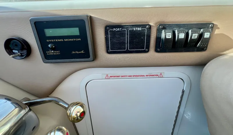 Reflections Yacht Photos Pics Control panel of 2005 Sea Ray 390 Motor Yacht with system monitor and switches.