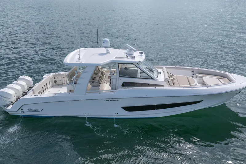  Yacht Photos Pics 2018 Boston Whaler 420 Outrage boat cruising on open water.