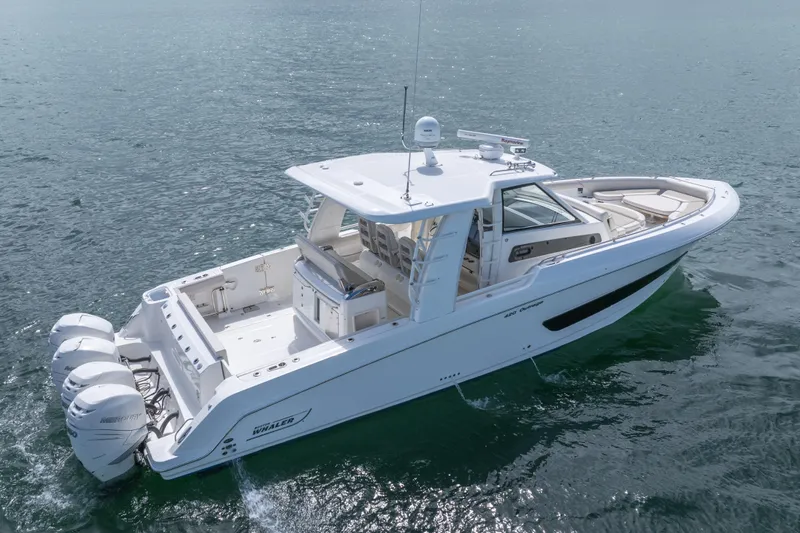  Yacht Photos Pics 2018 Boston Whaler 420 Outrage boat cruising on open water.