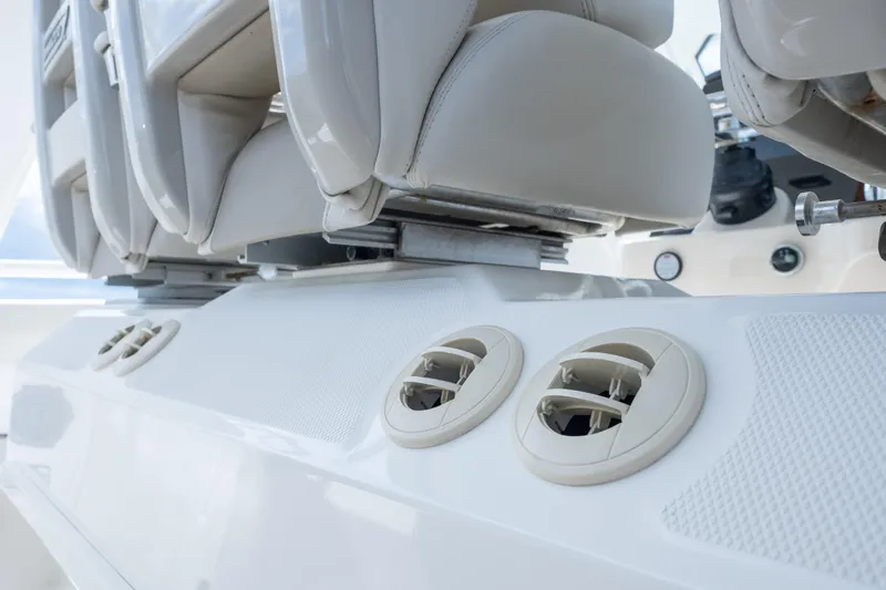  Yacht Photos Pics 2018 Boston Whaler 420 Outrage boat interior with white seating and air vents.