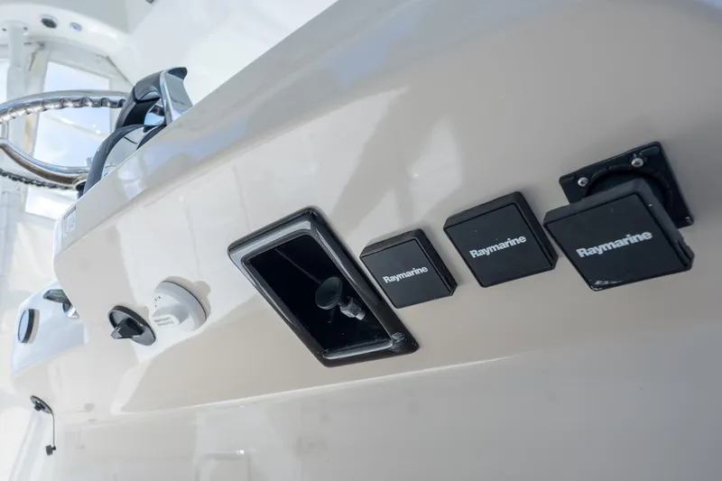  Yacht Photos Pics Control panel of 2018 Boston Whaler 420 Outrage with Raymarine electronics.