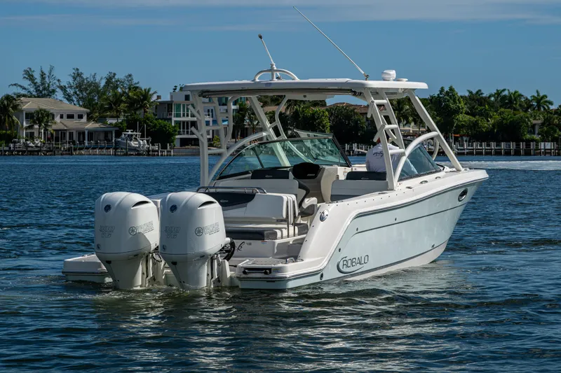  Yacht Photos Pics 2020 Robalo R317 Dual Console boat on water with twin Yamaha engines.